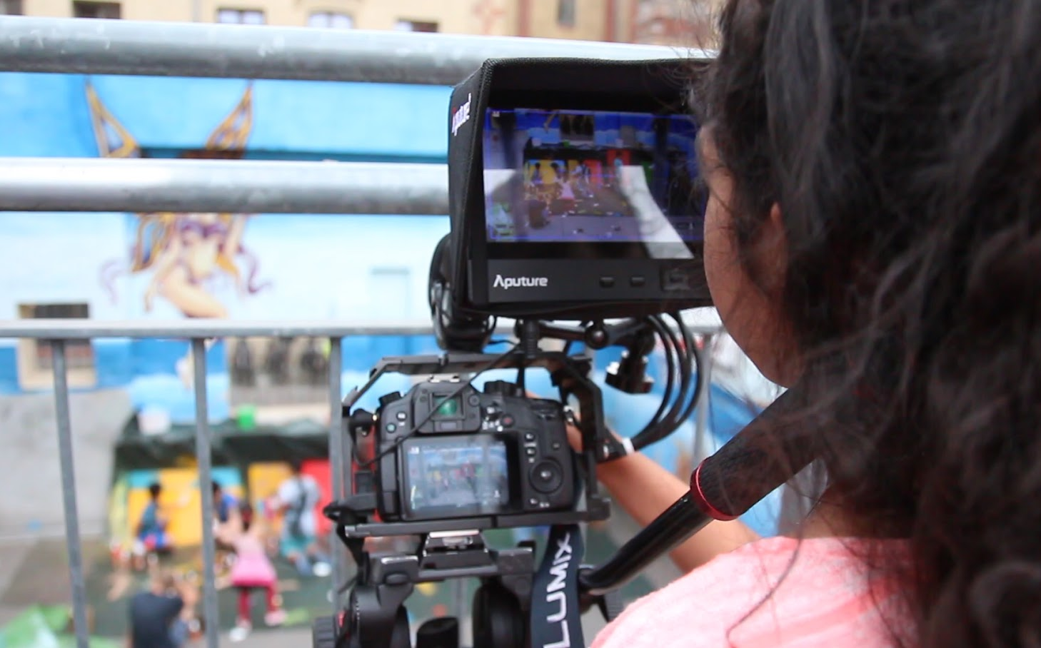 Teenager films others whil dancing